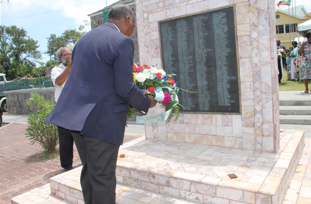 Premier of Nevis Hon. Vance Amory lays the first wreath on the M.V. Christena Disaster monument on the Samuel Hunkins Drive on August 01, 2017, in observance of the disaster’s 47th anniversary